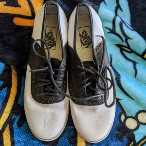 Black and white faux leather Vans
